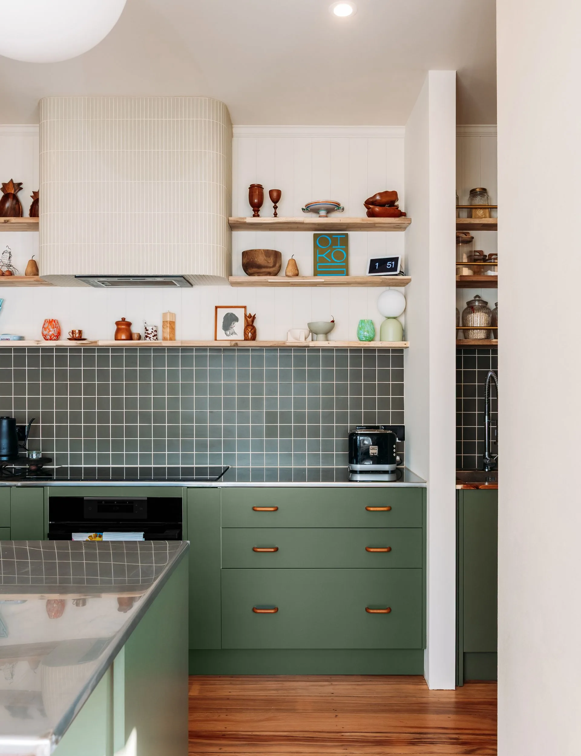 The finished kitchen with fresh paint on the melamine cupboards