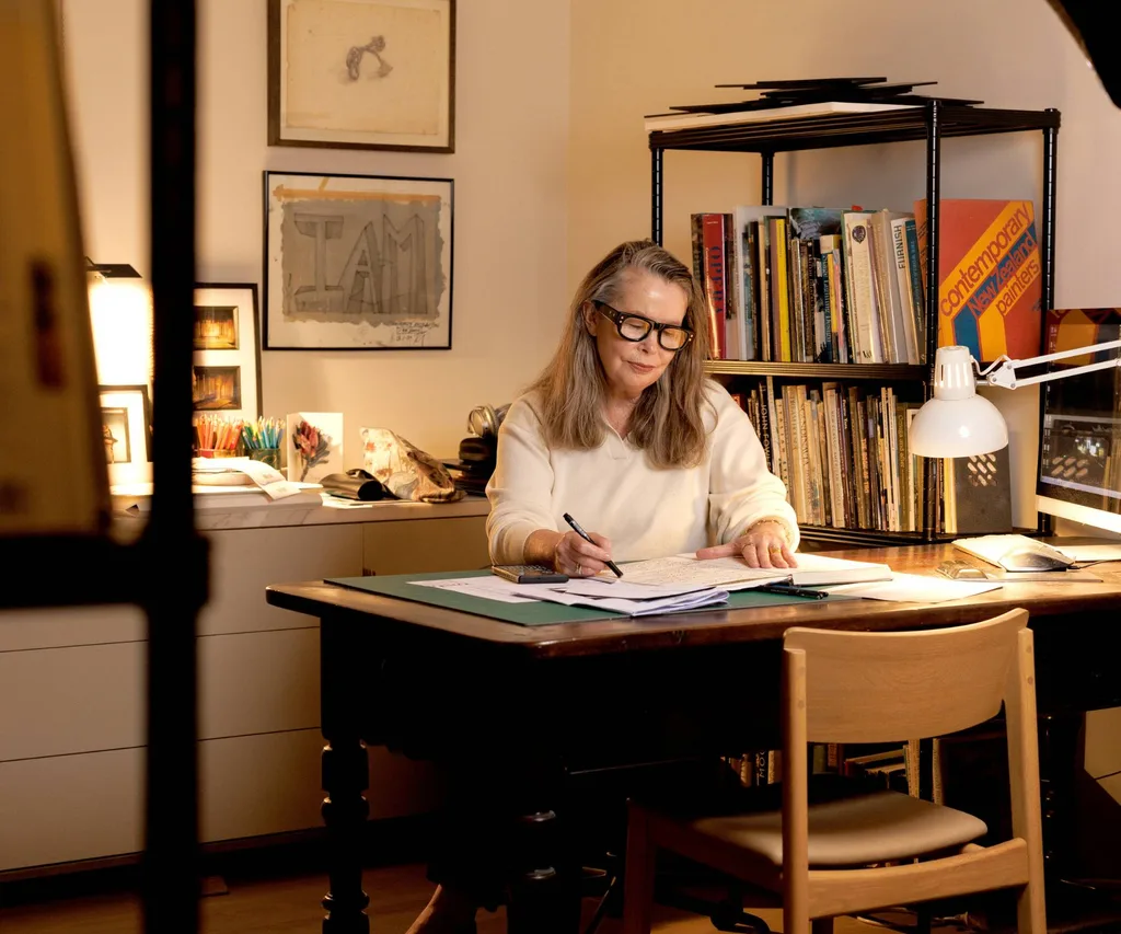 Tracy Grant Lord at her desk in her home office.