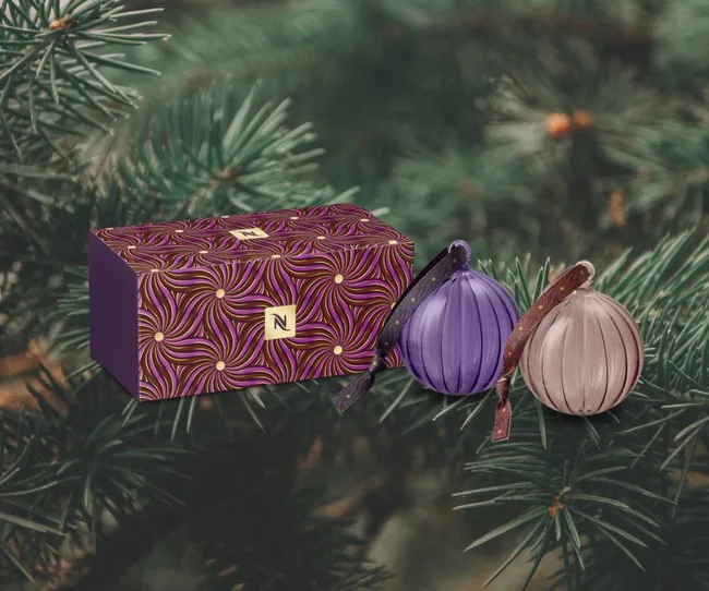 Nespresso purple and pink Christmas baubles