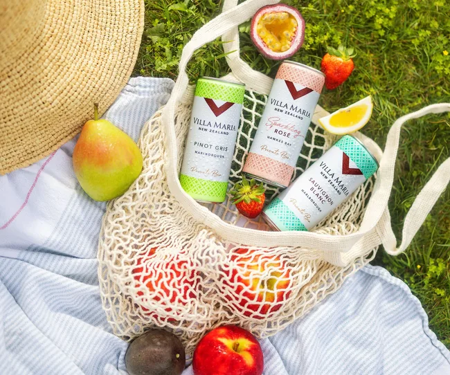 Canned villa maria wines in a basket