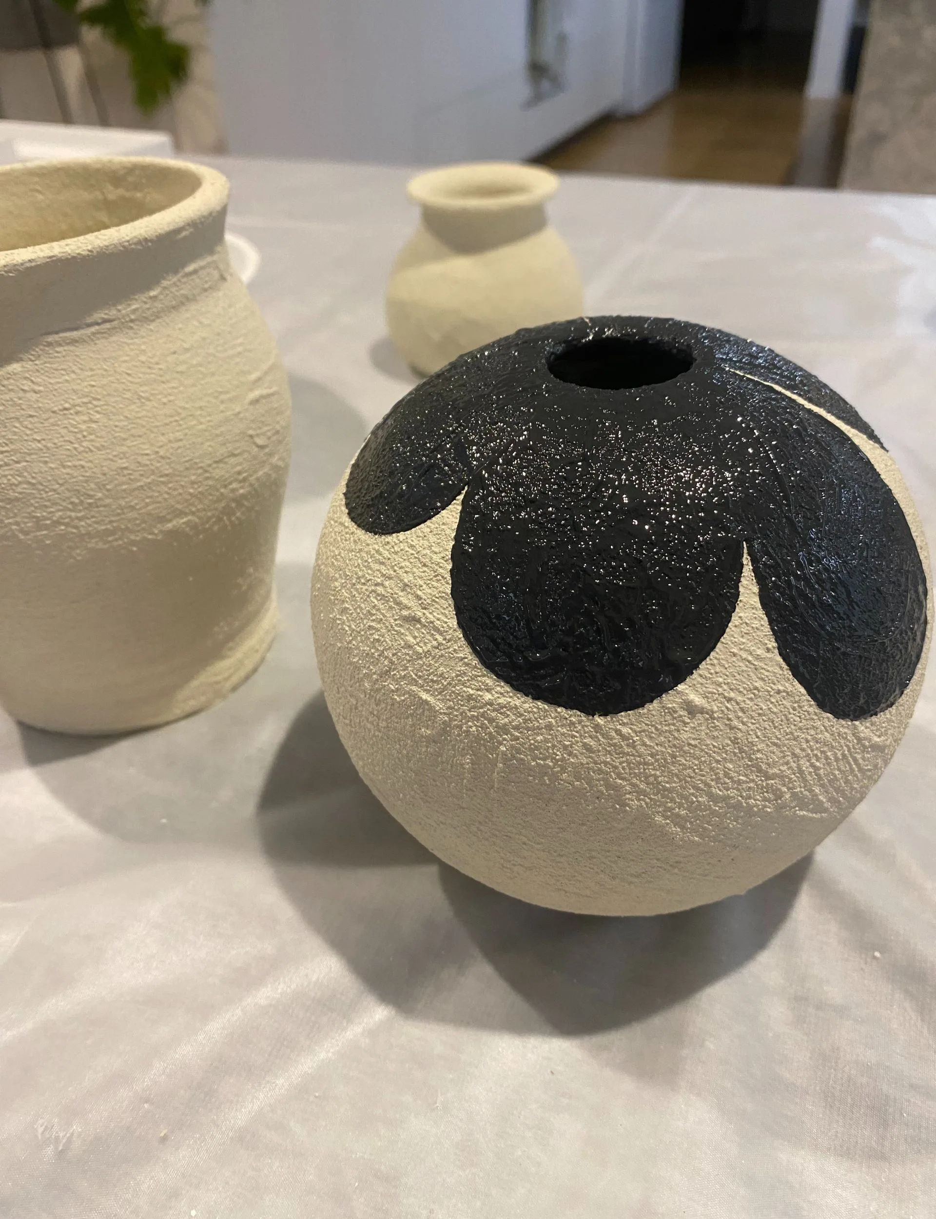 Paint the textured pottery in your favourite colours