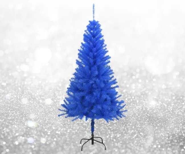 Blue Christmas tree against a sparkly background