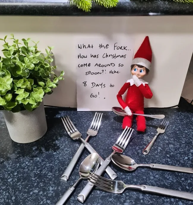Elf on the Shelf with forks and spoons