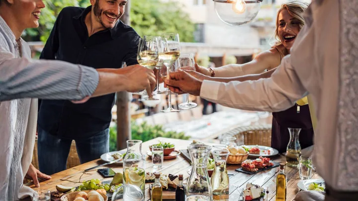 Friends cheers at a lunch