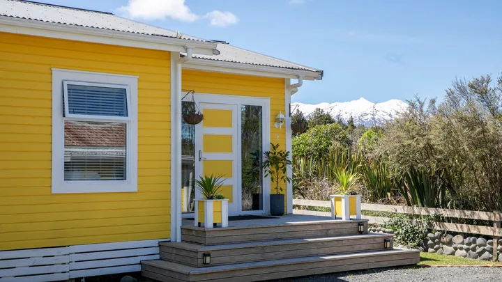 This yellow Waimarino home is the sunniest house on the street