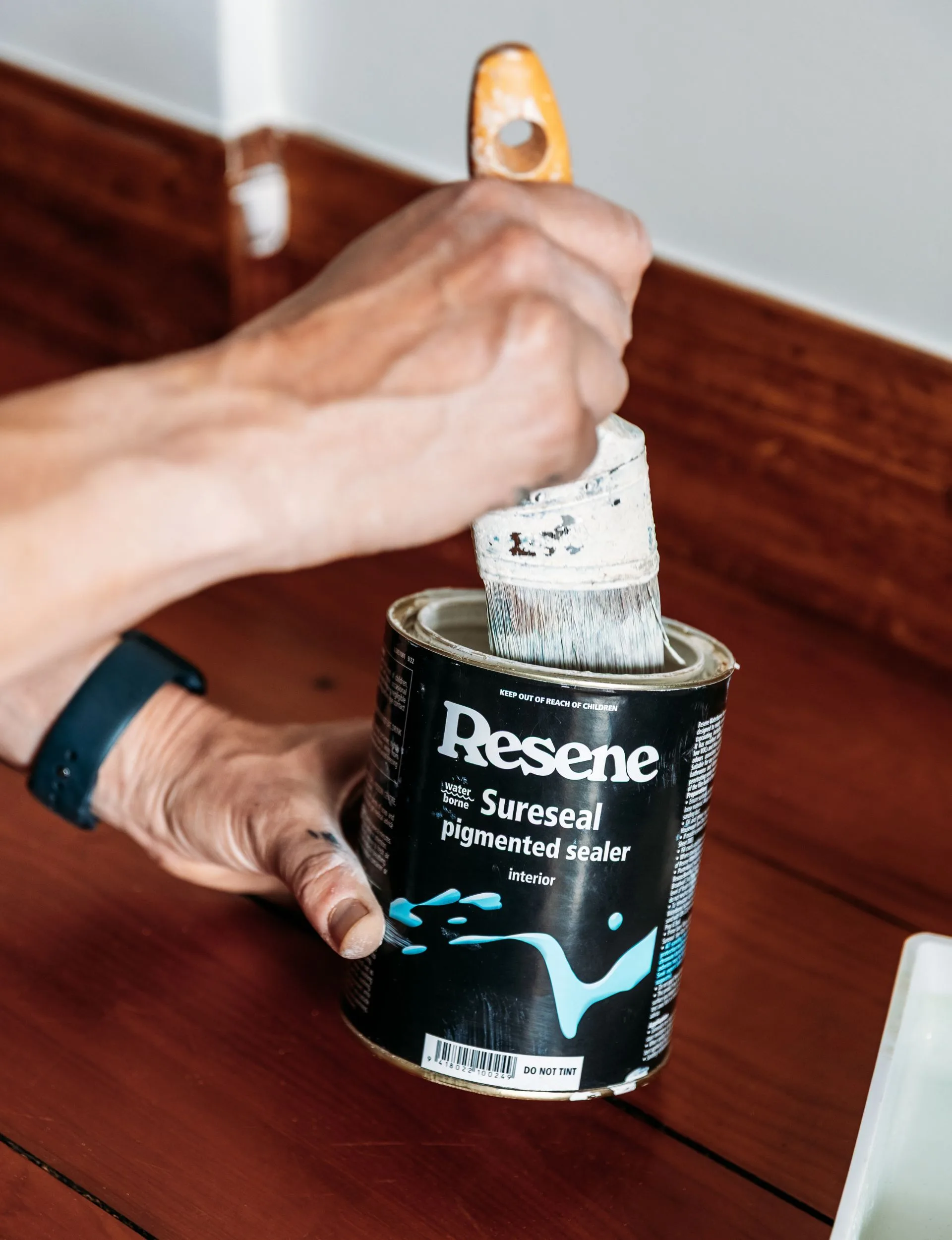 Step 2 is to prime the doors and trim with Resene Waterborne Sureseal