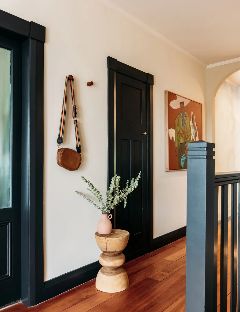 Final result is bold statement doors contrasted with the white neutral walls