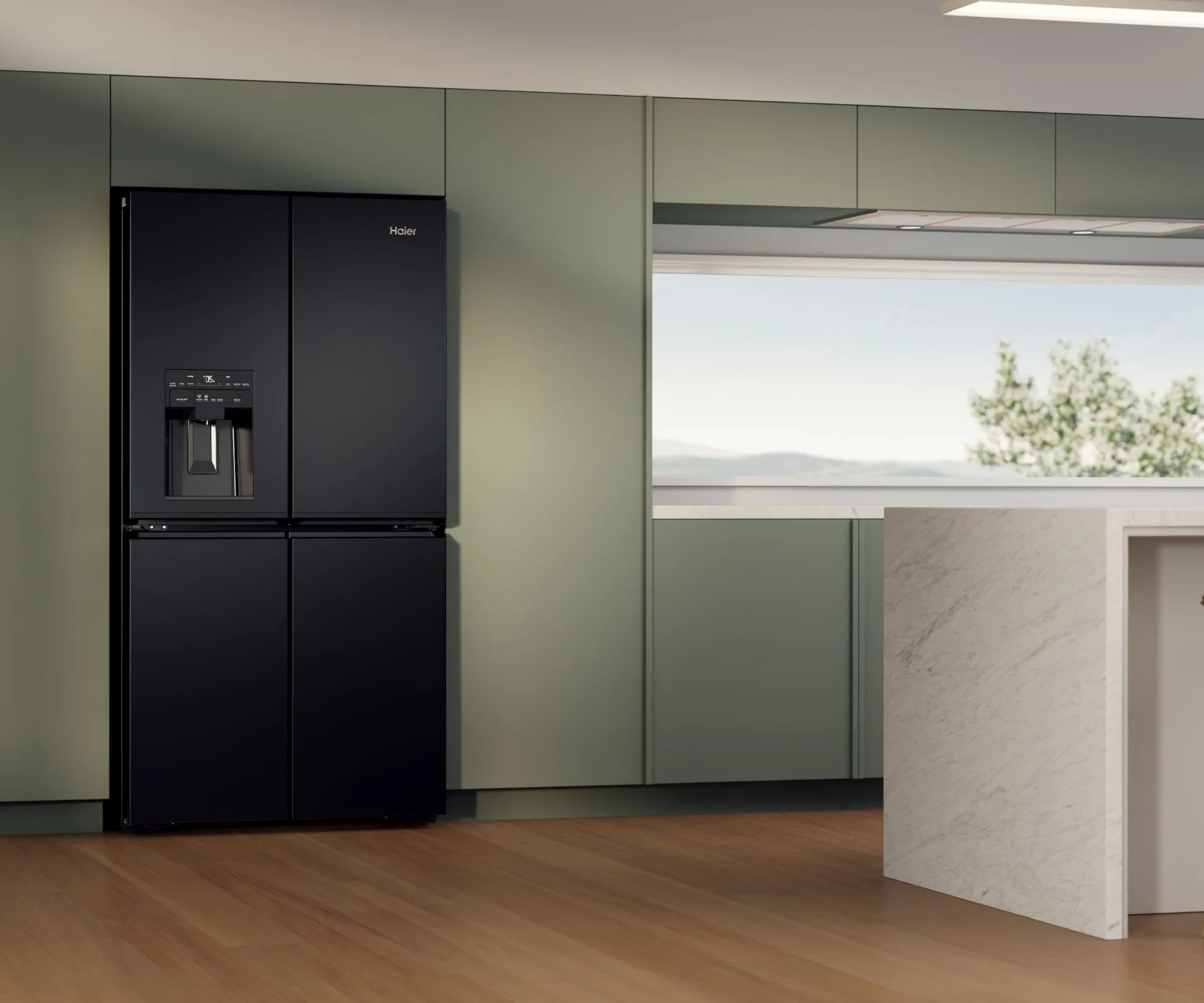 The Haier quad door fridge in a green kitchen