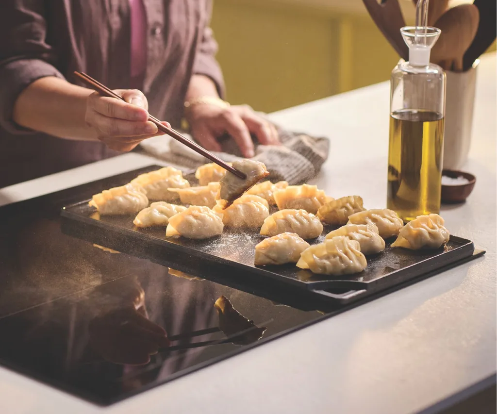 Cooking dumplings on the Haier stovetop