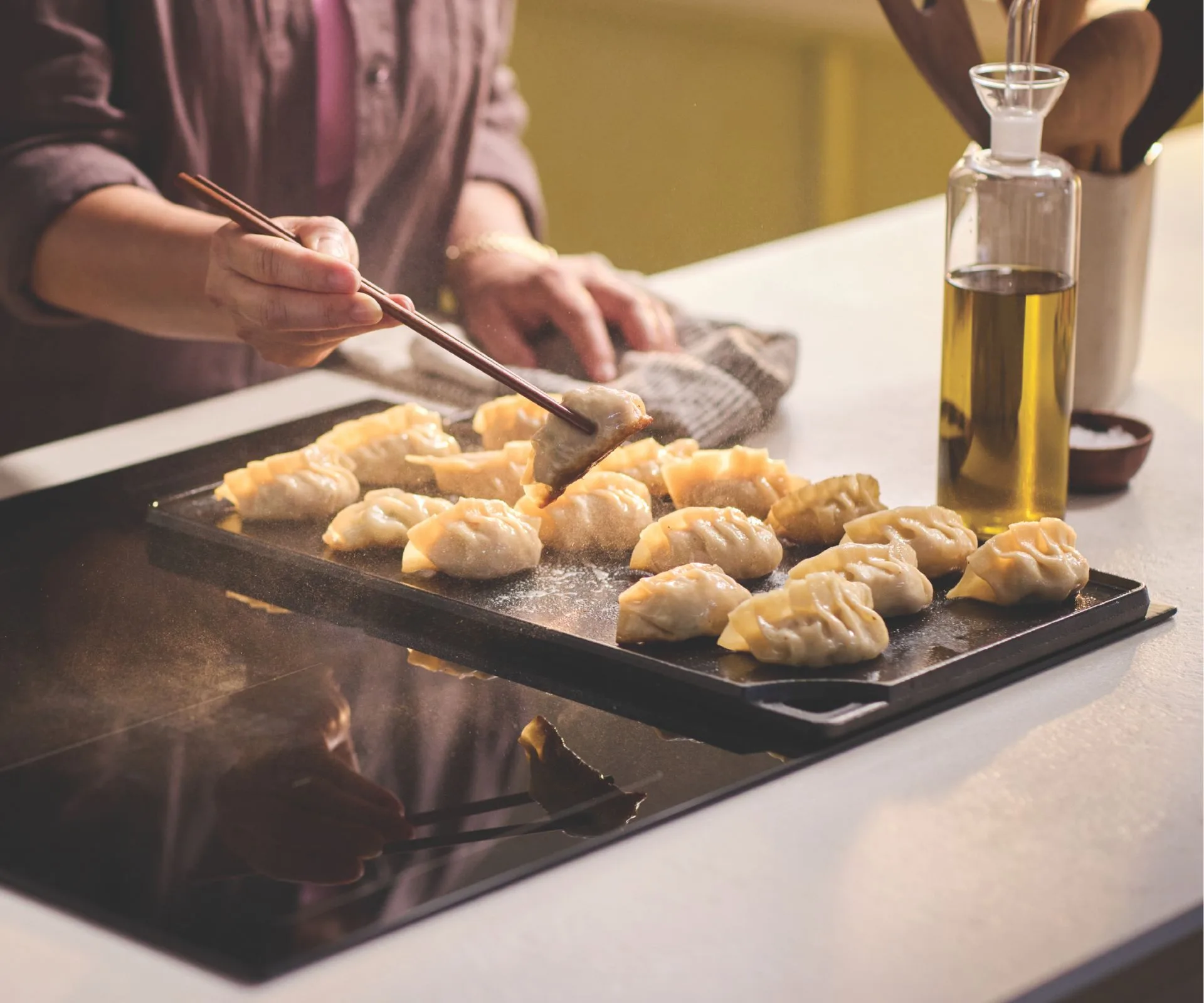 Cooking dumplings on the Haier stovetop 