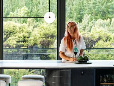Inside a Taupō Bay home designed to disappear into nature