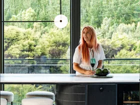 Inside a Taupō Bay home designed to disappear into nature