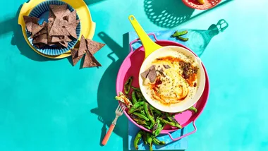 Blistered shishito with queso fundido