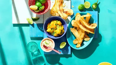 Plantain chips with lime cream and spicy mango salsa