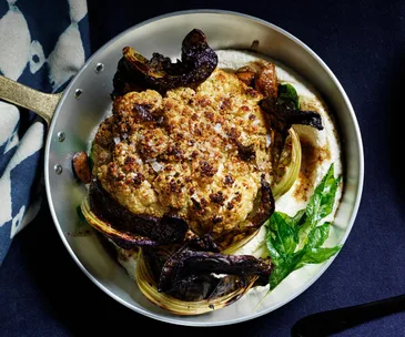 Whole roasted cauliflower with miso-almond cream
