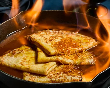 French dessert recipe for Crepes Suzette with flames