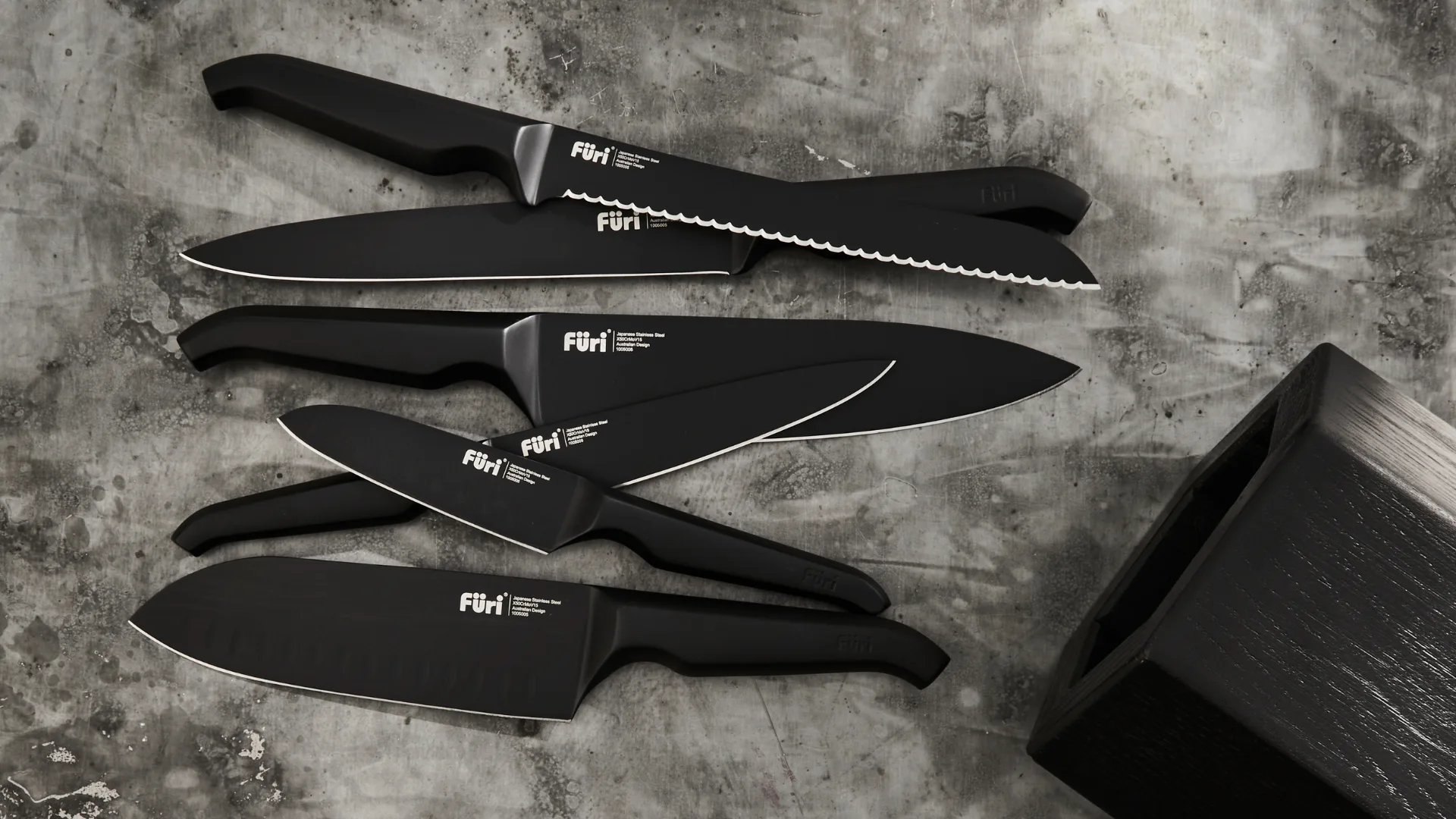 Six knives included with the Furi knife block laid out
