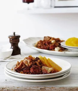 Pork belly, chorizo and breadcrumbs with oranges (Migas)