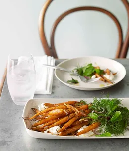 Baby carrots with labne and herb salad