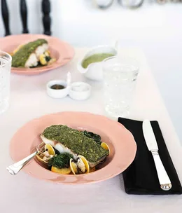 Pistou-crusted barramundi with pommes de terre à la Sarladaise