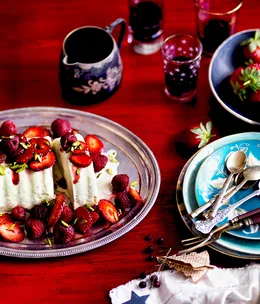 Pistachio ice-cream cake with red summer berries