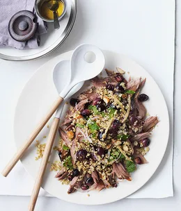 Lamb shoulder with grapes, freekah and parsley