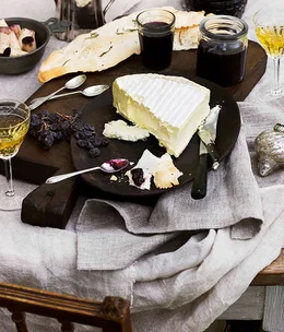 Fromager d’Affinois with grape jelly and rosemary water crackers