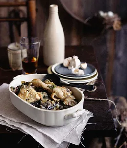 Chicken braised in beer with mushrooms