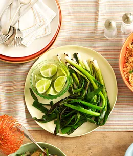 Chargrilled green onions with lime and white pepper