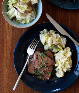Beef Sauerbraten with parsley mash and cabbage