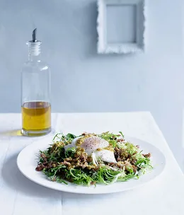 Rillettes, bitter greens and poached egg salad with garlic vinaigrette