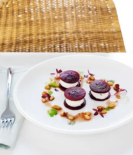Pickled beetroot with creamed goat's cheese and pine nut vinaigrette