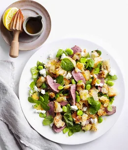 Lamb with torn bread, broad bean and mint salad