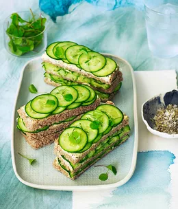 Triple-decker cucumber sandwiches with dill and lemon butter