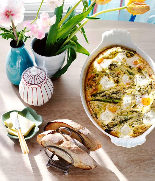 Grilled asparagus, herb and goat&rsquo;s curd baked eggs