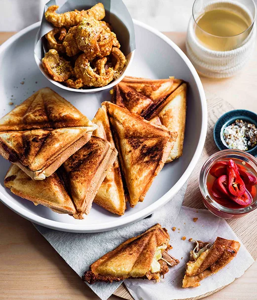 Pork and bean jaffles with pickled jalape&ntilde;os and spiced scratchings