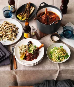Braised lamb shanks, burnt leeks and zucchini salad