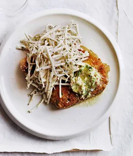 Crumbed pork chops with anchovy butter and celeriac chilli rémoulade