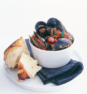Steamed black mussels with tomato sofrito and chorizo