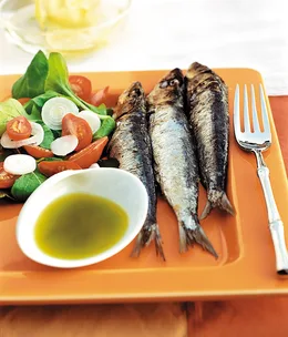 Grilled sardines with rocket oil