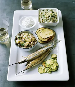 Garfish with fried vegetables, tzatziki, and burghul and black-eyed bean salad