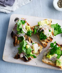 Ceviche toasts with avocado and coriander