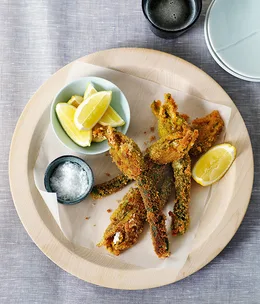 Zucchini flowers filled with herbs and goat's curd