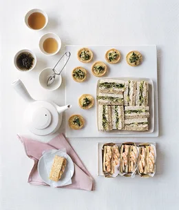 Little egg and anchovy tarts topped with celery salad