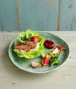Barbecue pork with butter lettuce, and cucumber and radish pickle