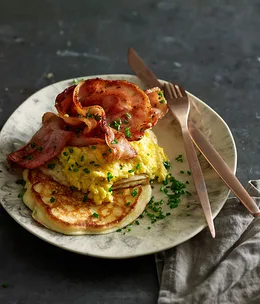 Sweet creamed corn with buttermilk pancakes and bacon