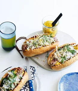 Pork sausages with caraway seed, cabbage and apple slaw