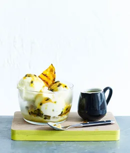 Grilled mango and passionfruit frozen yoghurt sundae
