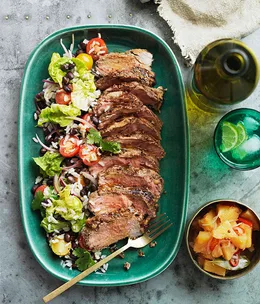 Pineapple-jerked pork neck with crushed pineapple relish and black bean and rice salad