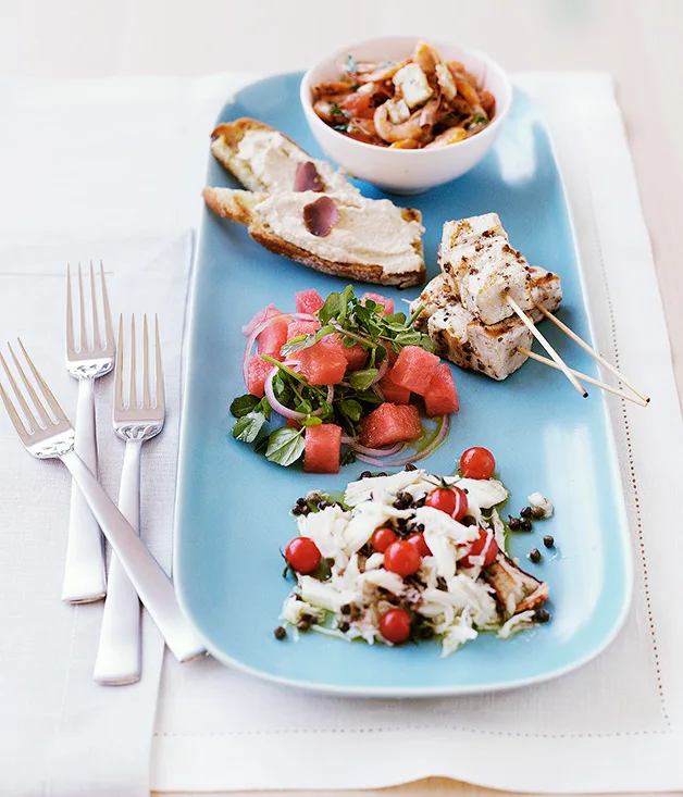 Swordfish kebabs with watermelon salad (pictured with school prawn saganaki, taramasalata toast and crab salad with cherry tomatoes and capers)
